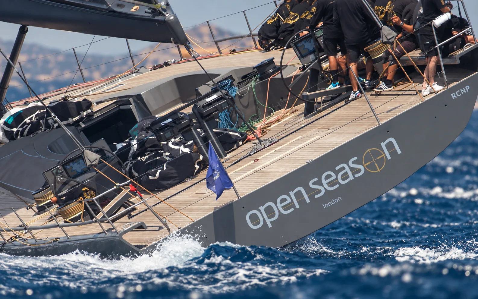 OPEN SEASON racing, seen from the stern quarter with her long aft deck